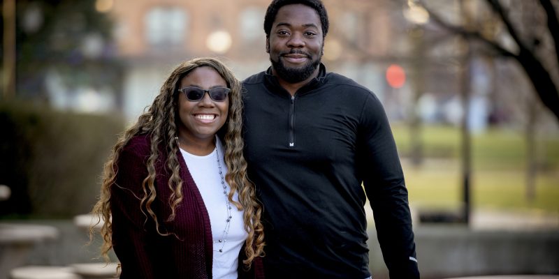 african-american-couple-park-sunlight-with-blurry-background